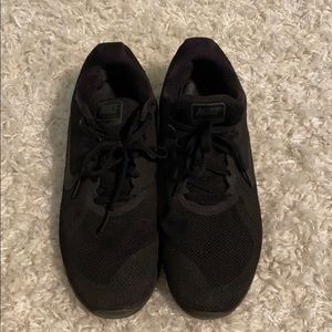 Nike black running shoes